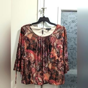 Sara Michelle pullover Blouse with Paisley and Coral like pattern.  Sparkles .